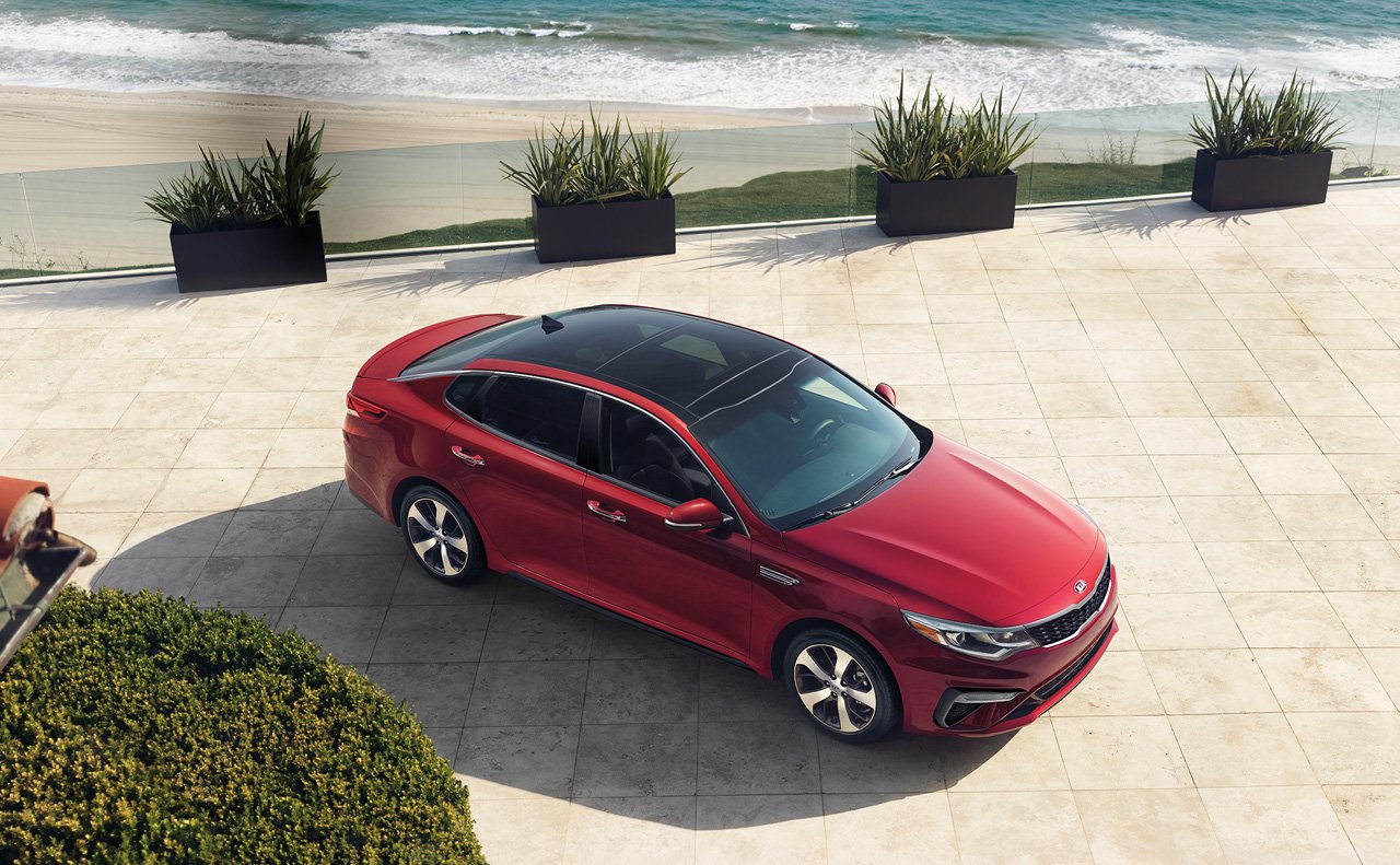 2019 Kia Optima Red Parked Beach Exterior