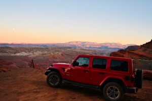 Red Jeep Wrangler in Red Rock country