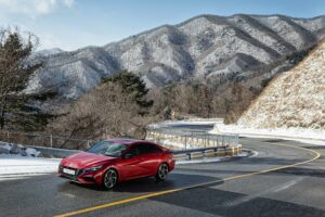 Red Hyundai Elantra on mountain road