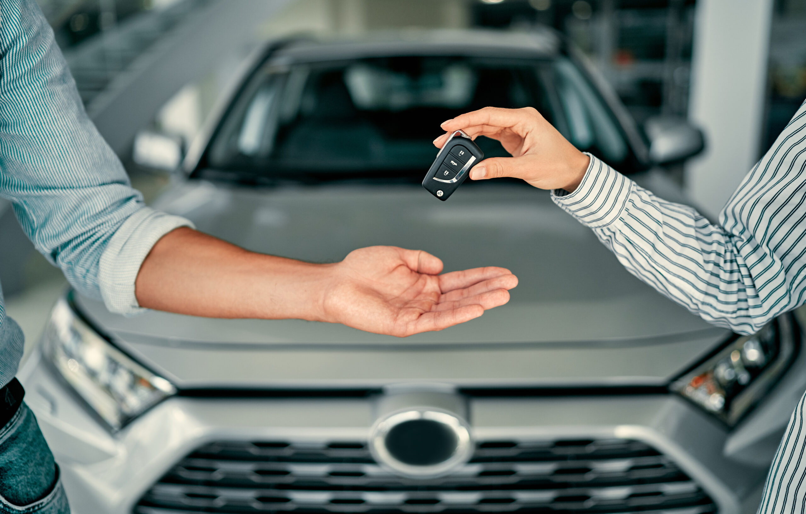 Car keys changing hands when buying new vehicle