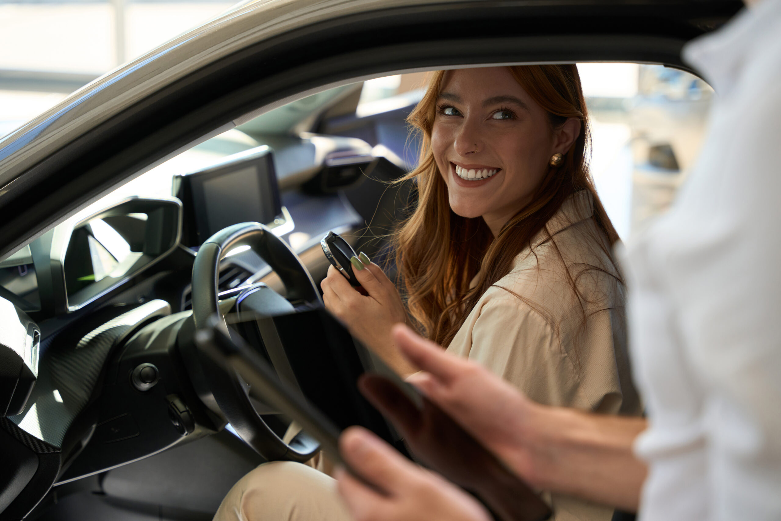 Women at wheel of new Hatchback