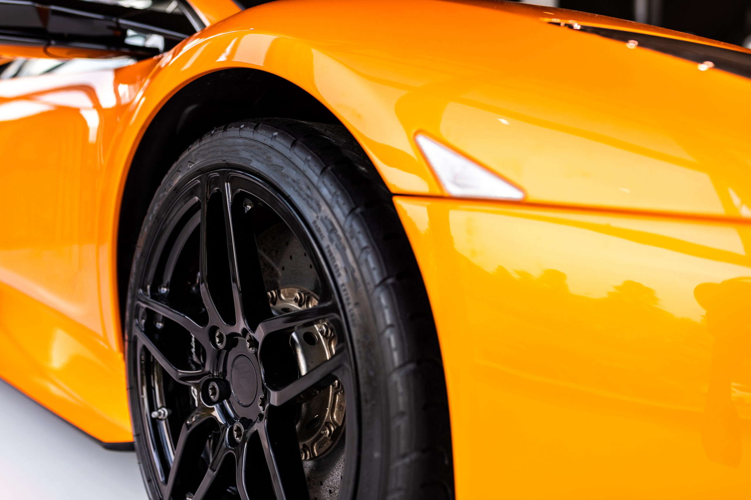 luxury car wheel orange body