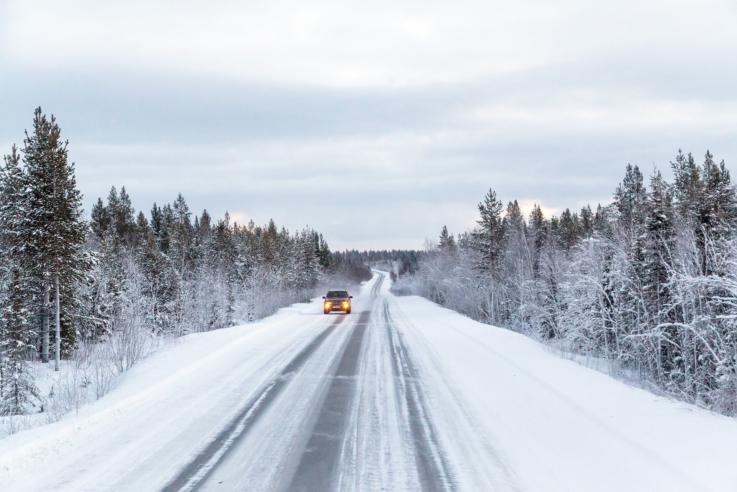 car driving on snowy road