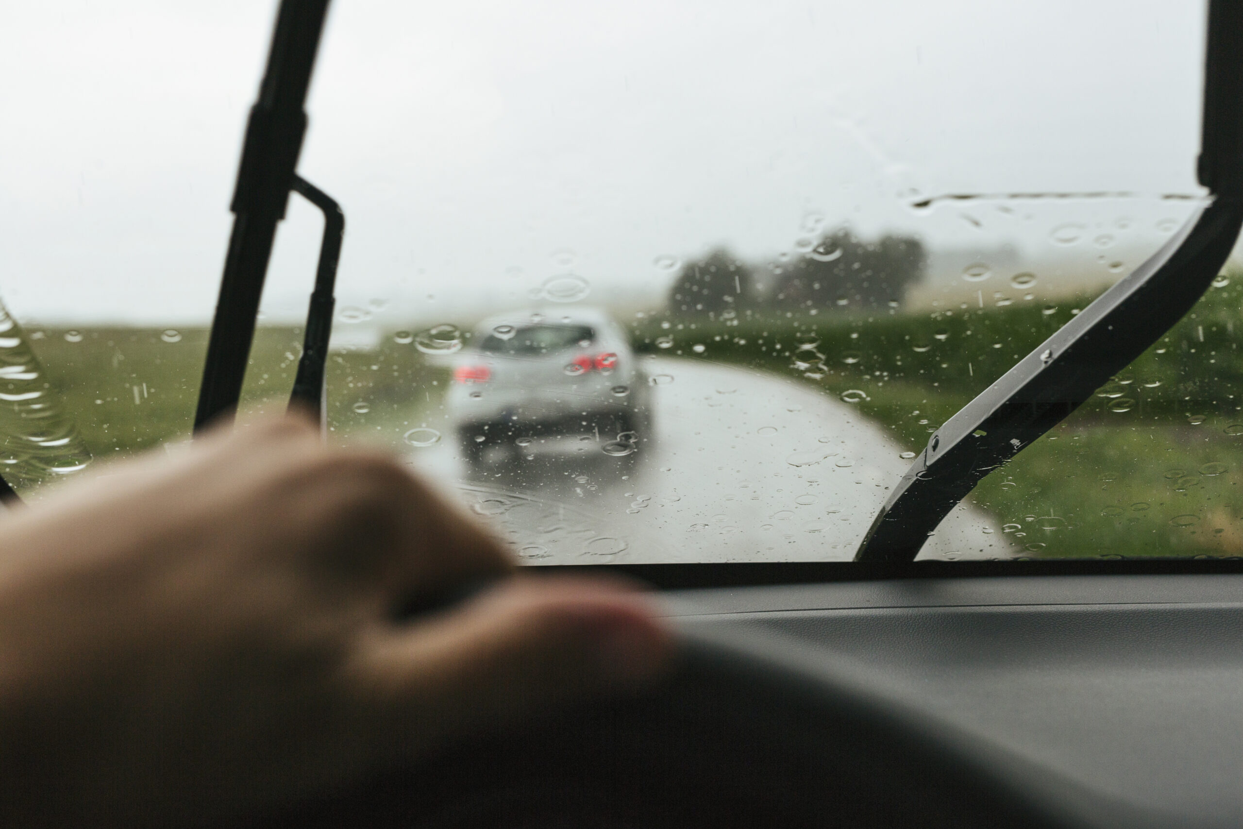 Interior view driving car in rain